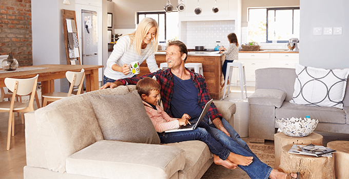 family sitting in living room